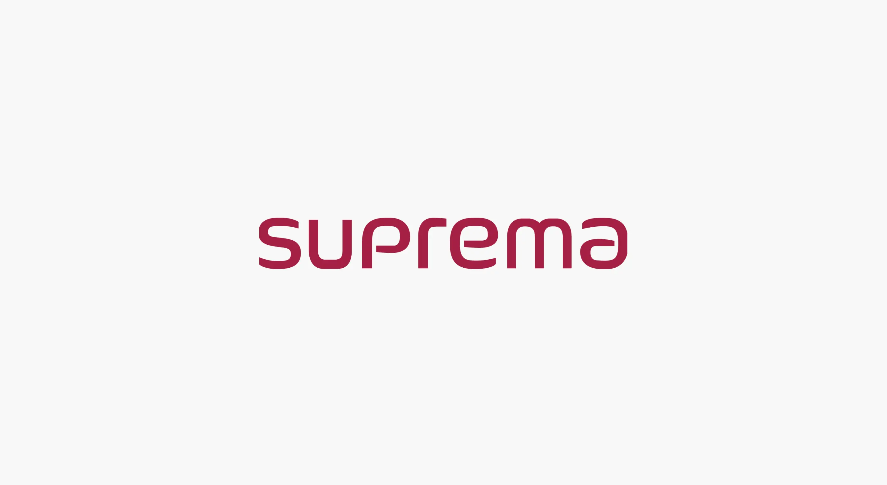 a red suprema logo on a white background